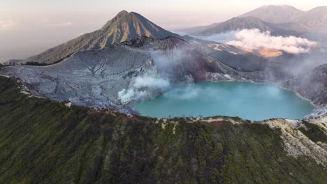 spectacular drone view over ijen volcano crater rim, volcanic landscape of indonesia.