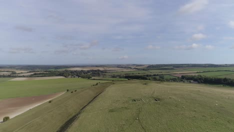 Aerial-tracking-along-the-northern-ramparts-of-Maiden-castle-towards-the-eastern-gate