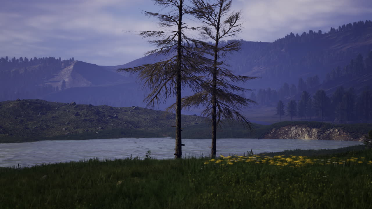Beautiful serene lake surrounded by mountains and trees at dusk