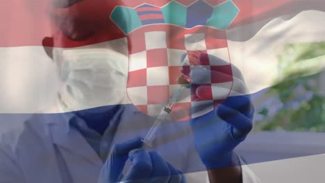 Animation-Der-Flagge-Kroatiens,-Die-über-Einem-Arzt-Weht,-Der-Eine-Gesichtsmaske-Trägt-Und-Einen-Impfstoff-In-Der-Hand-Hält