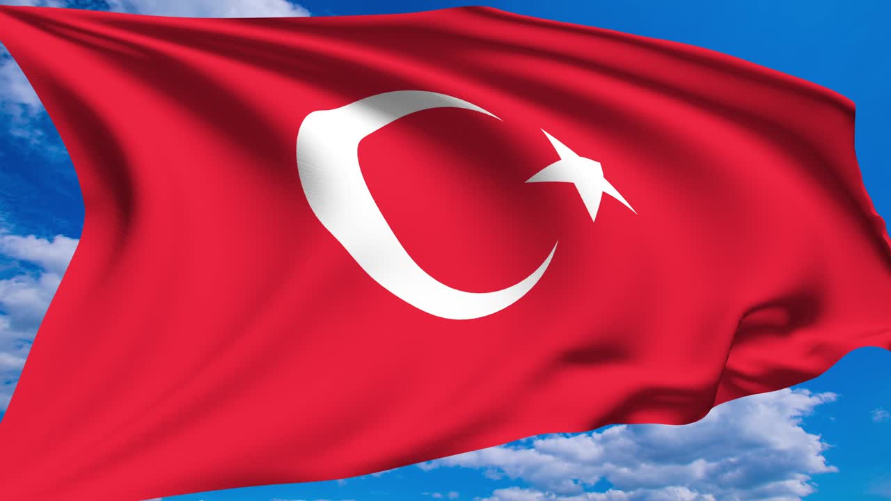 Flag of Turkey against a cloudy sky (alpha channel, loopable)