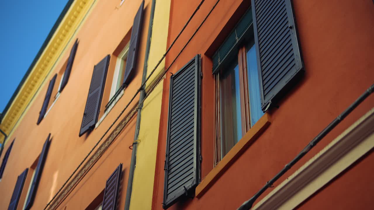 Colorful Italian Building with Shutters