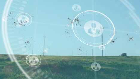 wind turbines spinning on hillside while animated renewable energy hud displaying business avatars