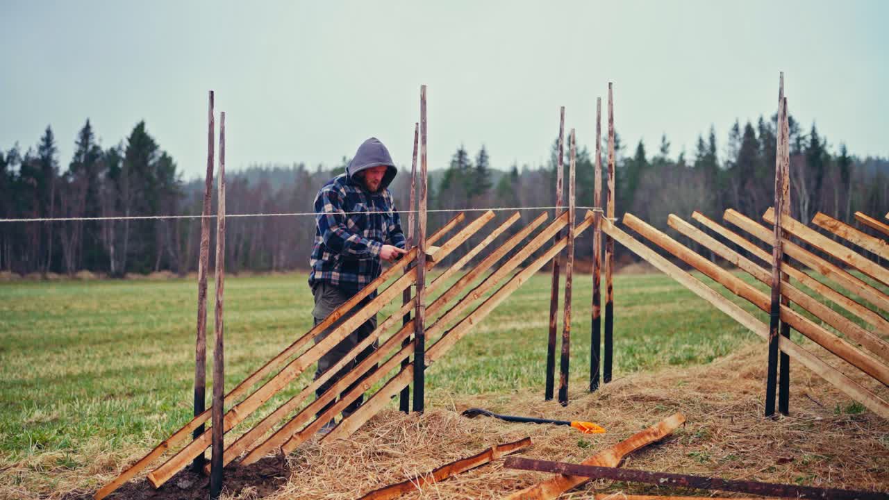 Constructing Skigard (Traditional Fence) In Norway - Wide Shot