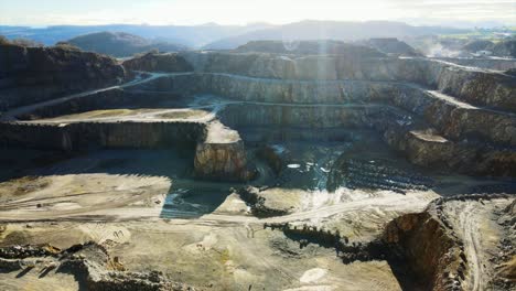 uncovering the earth's limestone: an aerial view of a massive quarry in germany