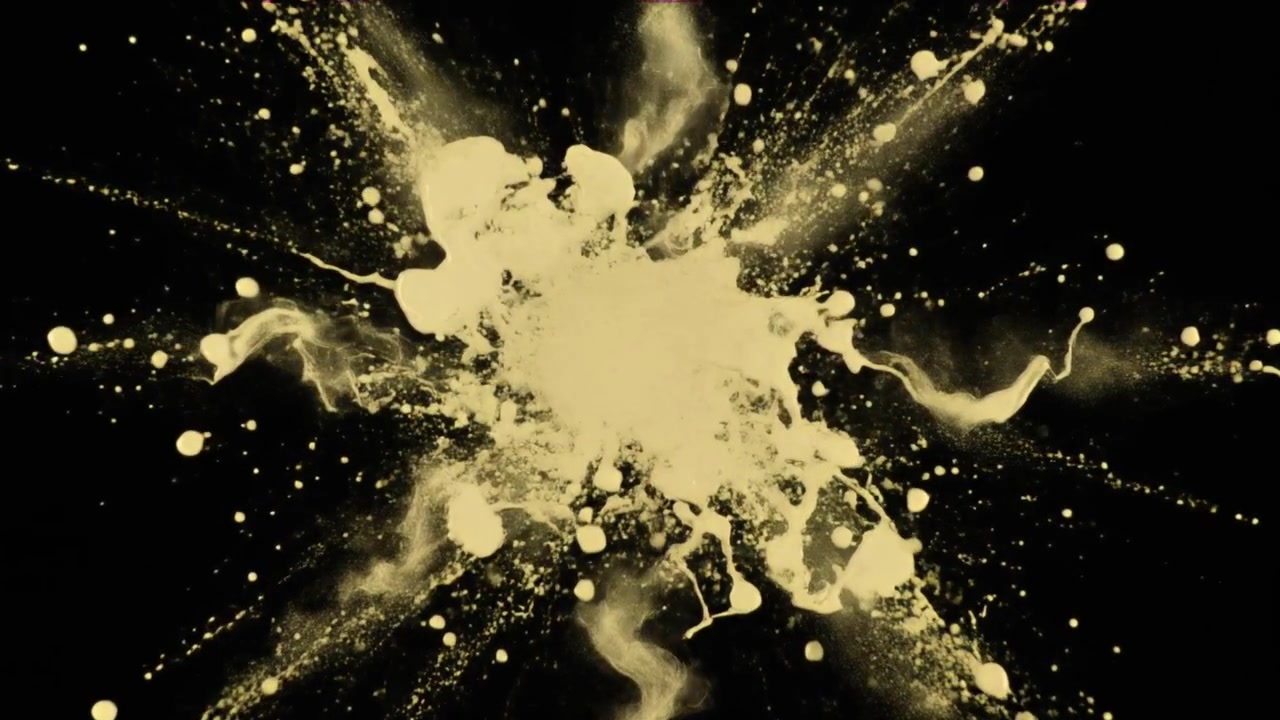 Gylden pulvereksplosion mod sort baggrund