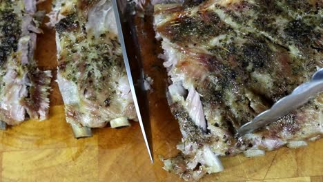 Slicing-Baked-Tender-Pork-Ribs-with-a-Knife