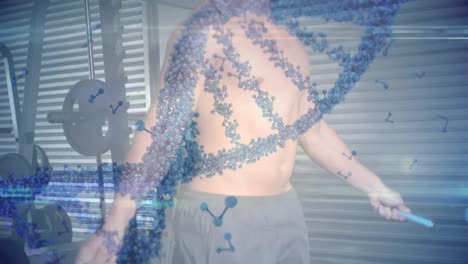 체육관에서 운동하는 강한 남자 위의 dna 가닥의 애니메이션