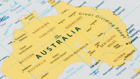 Close-up-of-the-country-word-Australia-on-a-world-map-with-the-detailed-name-of-the-capital-city