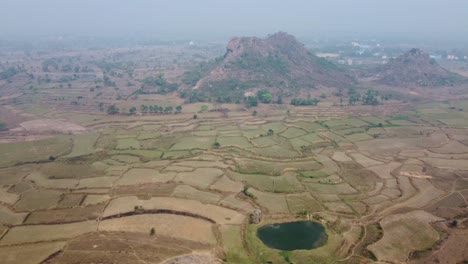 Drone-video-shot-of-vast-area-after-harvesting-in-plateau-region