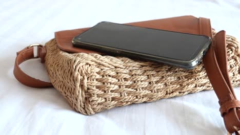 straw bag with phone