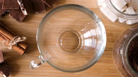 coffee preparation with sugar, chocolate, and cinnamon