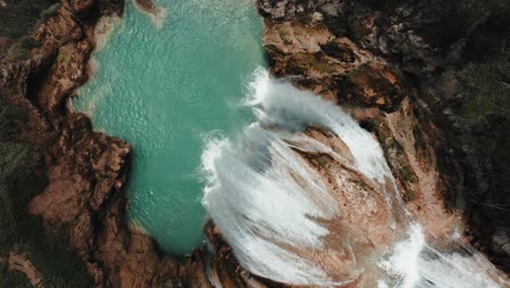 scenic waterfall el chiflon in chiapas, mexico - aerial drone shot