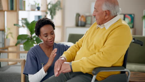 nurse assisting elderly man in wheelchair