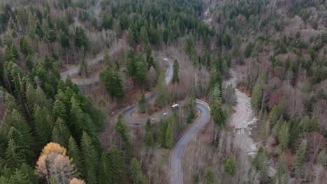 Astonishing-Green-Virgin-Forest-And-Serpentine-Road-In-Bucegi-Mountains,-Romania