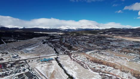 Aerial-drone-shot-overlooking-downtown-Fairplay,-Colorado-with-mountains