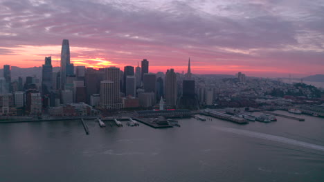 aerial slider shot of san francisco city port skyline at sunset