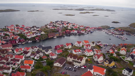 aerial orbit view of traditional swedish cottages in the coastal archipelago