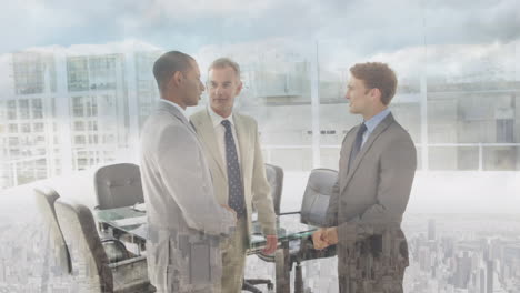 digital composition of diverse businessmen shaking hands at office against aerial view of cityscape