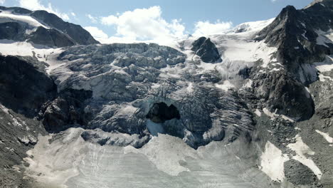 Very-close-aerial-view-of-a-glacier-in-Zinal,-Switzerland