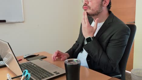 young businessman: analytical computer work
