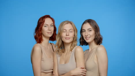 three women smiling together