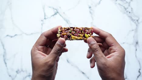 close-up of a pistachio and chocolate candy bar