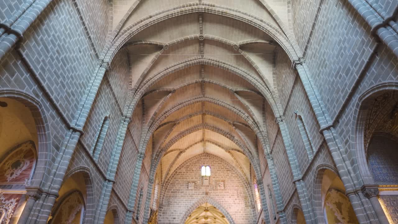Stone nave and ribbed vaults in historic church interior in évora portugal