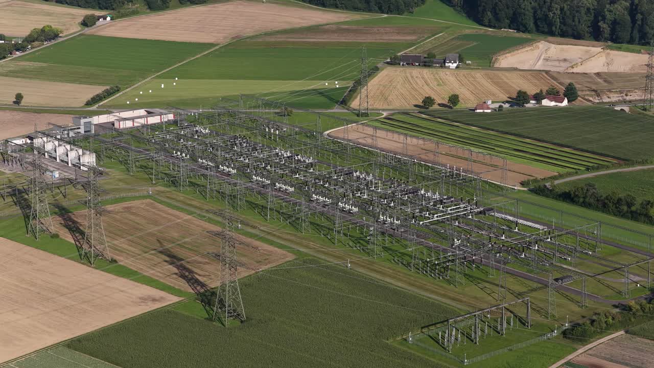 High voltage, power lines, electric grid installation infrastructure. Aerial drone video