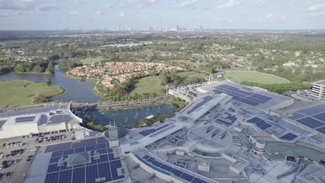 massive shopping mall robina town centre with rooftop solar systems in robina suburb, queensland, australia