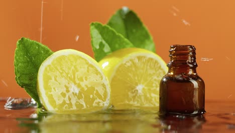 lemon halves and bottle in water close-up, lemon juice. raining, aroma serum on orange background. liquid citrus extract, skincare routine, treatment spa concept. traditional medicine