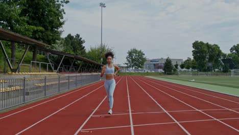 woman running on a track