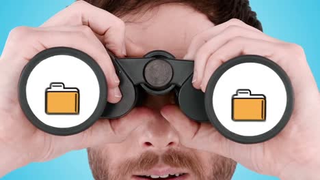 Man looking through binoculars