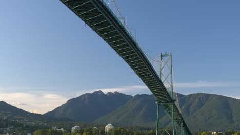 Crossing-Under-Famous-Lions-Gate-Bridge-In-Vancouver,-Canada