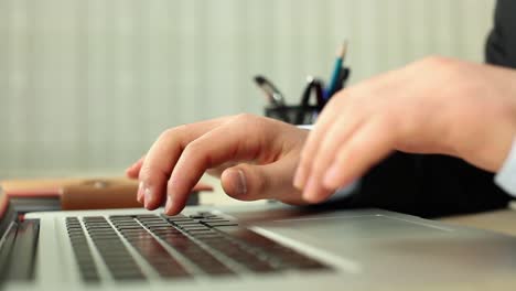 close up businessman using computer in office 1