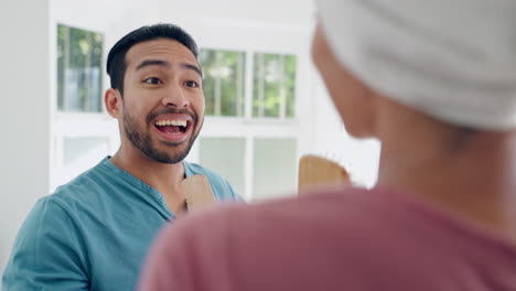 Couple-dance,-brush-and-singing-in-bathroom