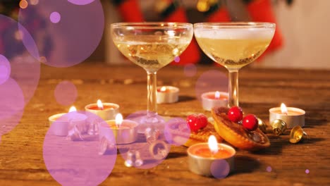 animación de puntos violetas que se mueven sobre vasos con vino y luces de té