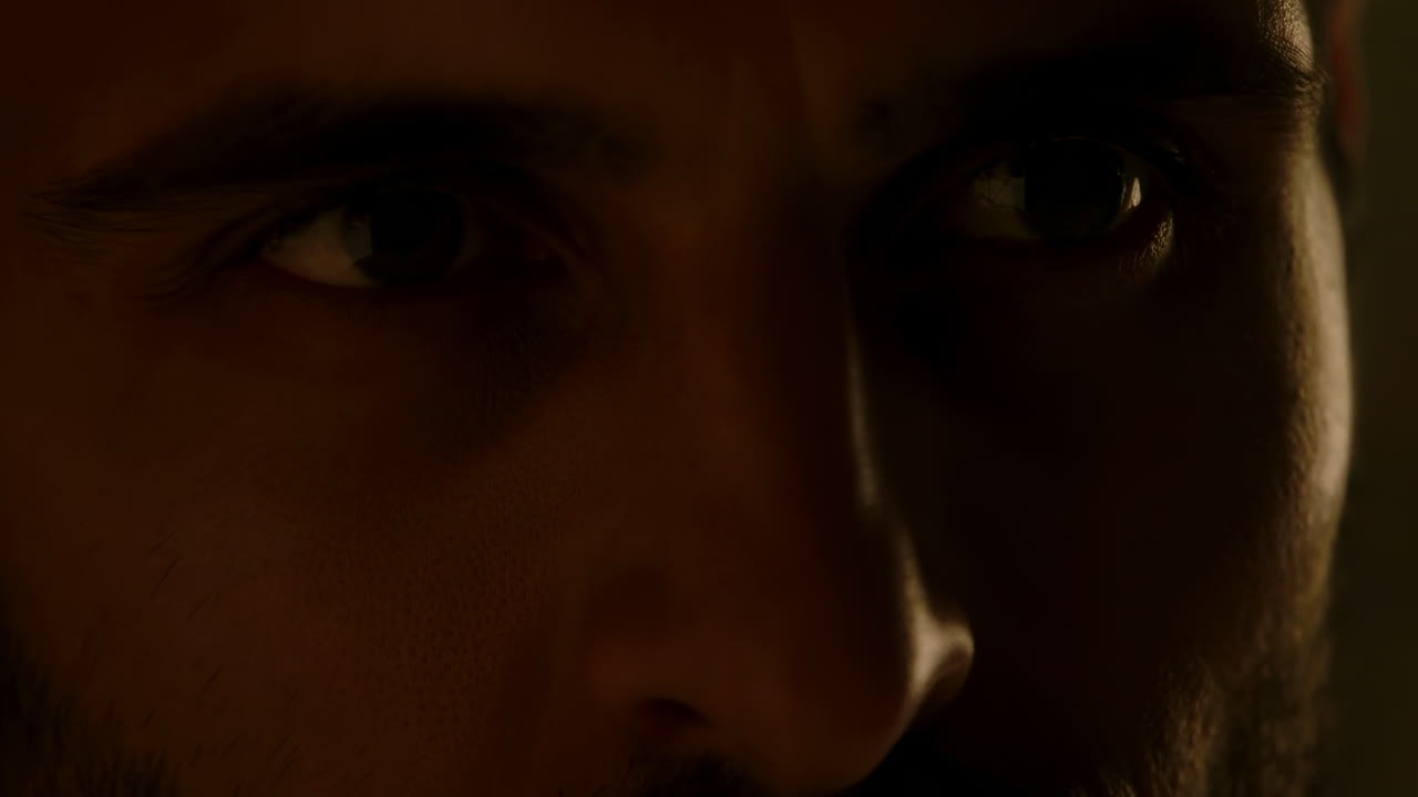 Intense Closeup Of South Asian Man Eyes, Low Light Interrogation Vibe, Furrowed Brow And Beard, Silent Tension
