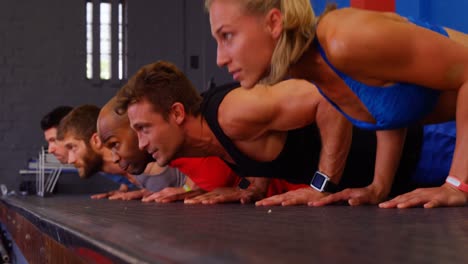 Group-of-people-performing-push-up-exercise