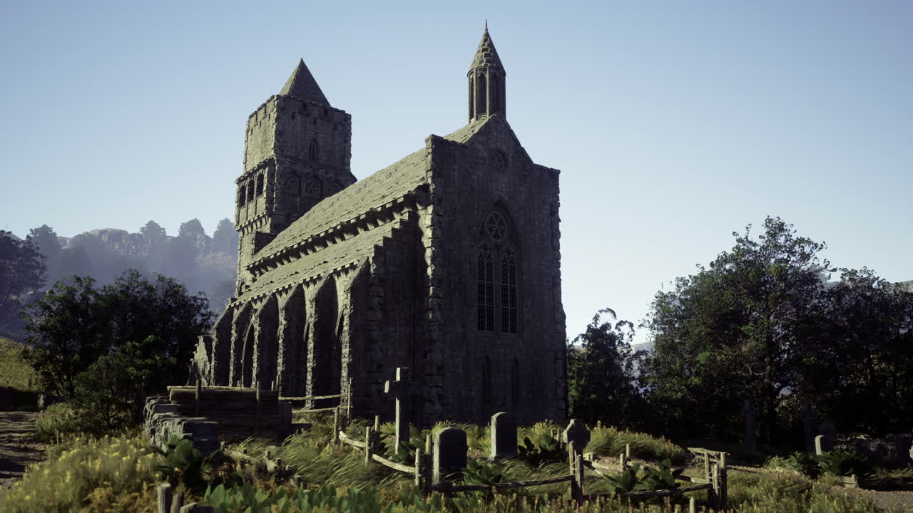 Ancient stone church stands amidst overgrown landscape in daylight