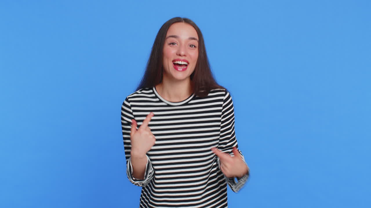 Caucasian woman feeling proud pointing herself overjoyed by success making choice selfconfident