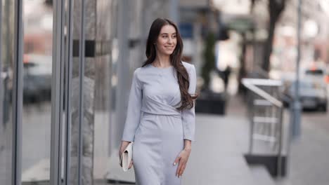 stylish young woman walking spinning with long hair