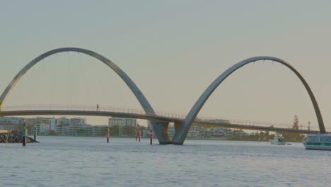 afternoon activity golden hour elizabeth quay bridge over river, boat crossing, time-lapse