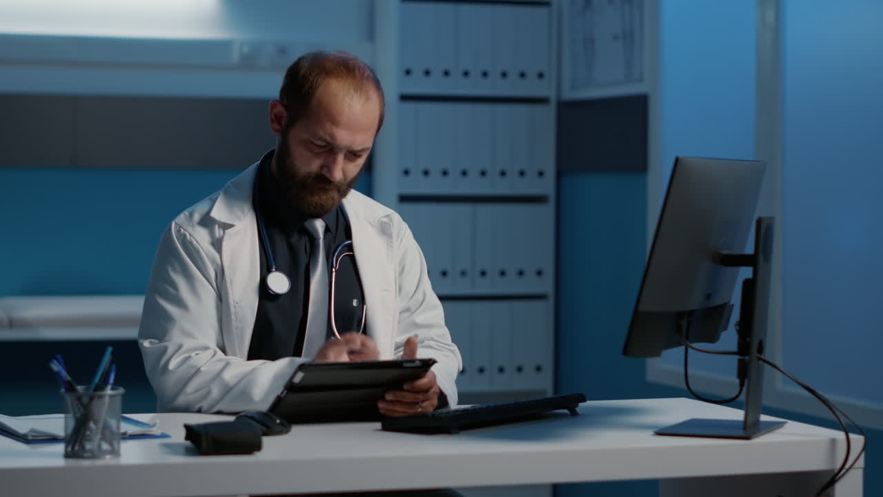 Doctor using a tablet in a medical office