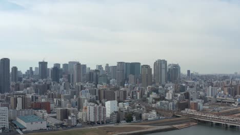 osaka umeda ward, aerial pan establishing shot, japan