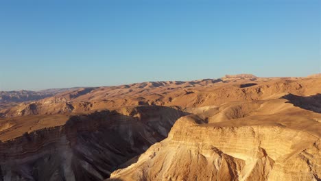 panoramic view of arid desert mountains and canyons