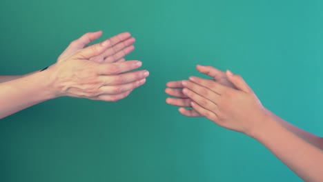 applause. two persons clapping hands, applauding on green screen chrome key background. 4k video