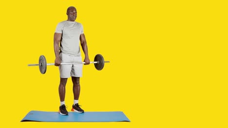 african man doing deadlift exercises with bar with weights