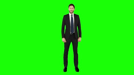 standing businessman looking arond