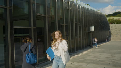 beautiful ukrainian student in a hurry running at the ehwa womans university in seoul, south korea